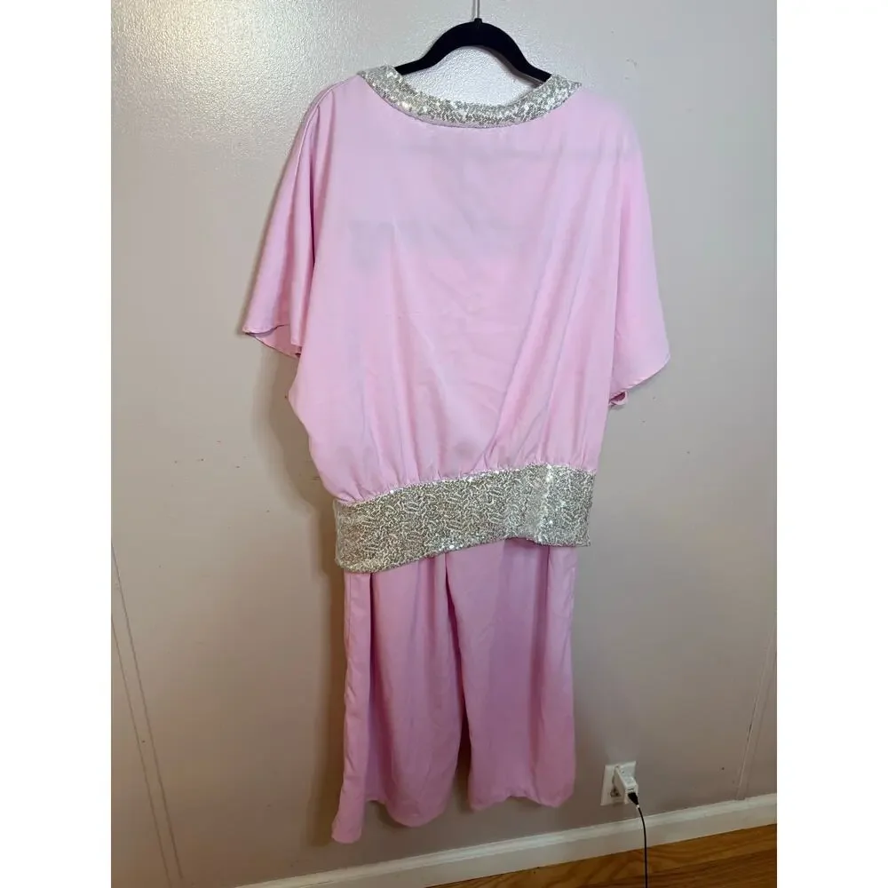 Pink two-piece batwing-sleeve pantsuit. Sparkling silver sequin trim. Size L.